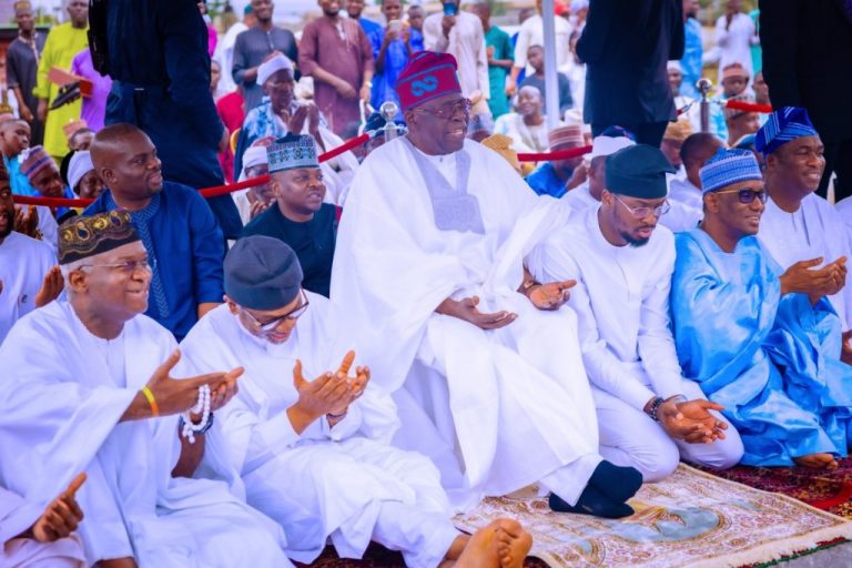 Dodan Tinubu prays at the Dodan Barracks prayer site on Eid ul-Kabir. | The ...